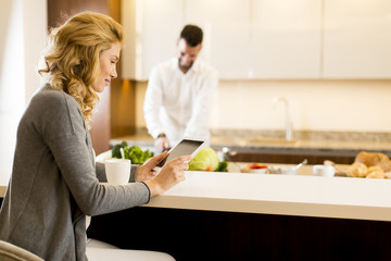 Young couple in the modern kitchen