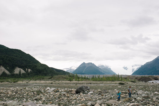 Two children exploring rocks, National Park, Alaska, North America 