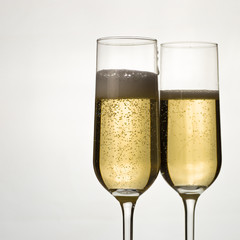 two glasses of sparkling white wine