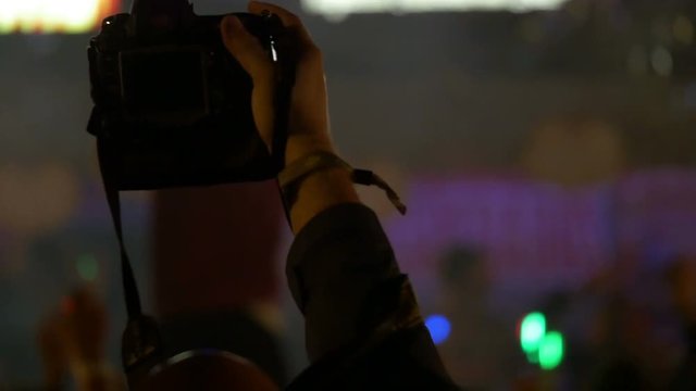 4K taking picture at live music concert, festival