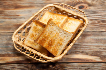 Breakfast. Toast on a rustic wooden background