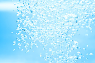 closeup of blue bubbles underwater