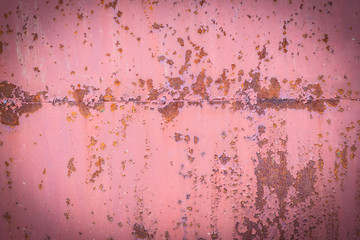 Old rusted metall pink texture. Corroded weathered iron background. Abstract grunge vintage effect