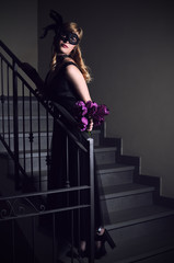 beautiful girl in black mask