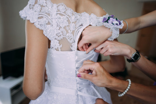 shawl tied behind back