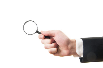 hand holding magnifier glass