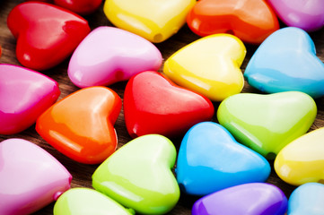 Fototapeta na wymiar Colorful Valentines Day background with hearts.