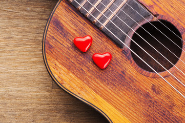 Valentines Day background with hearts on vintage guitar