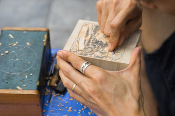 Wood carving in Asian street