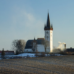 view to old tower of castle under blue sky