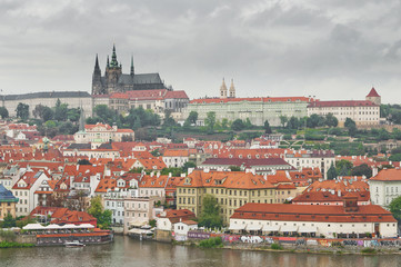 Fototapeta premium Panoramic View on the autumn Prague City with Castle and St. Nic