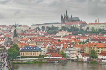 Naklejka na ściany i meble Panoramic View on the autumn Prague City with Castle and St. Nic