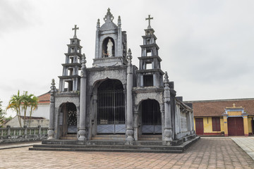 Obraz premium Small church in Phat Diem Stone Cathedral - one of the most famous and beautiful churches and travel destination in Vietnam. It took 24 years to build this church from 1875 to 1898