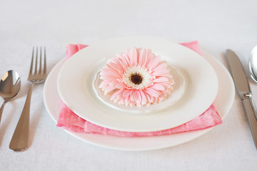 Valentine's Day pink decorated table setting for romantic dinner
