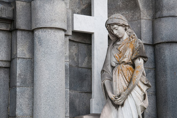 holy Mary statue in front of a church