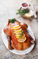 Roast duck with rosemary and citrus, selective focus