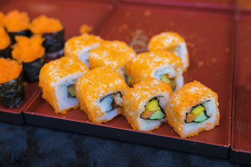 Japanese food roll with red caviar