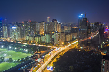 Fototapeta na wymiar Aerial view of Hanoi skyline cityscape at night. Le Van Luong - Khuat Duy Tien intersection , Cau Giay district