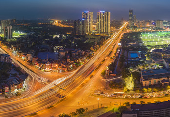 Fototapeta na wymiar Aerial view of Hanoi skyline cityscape at night. Le Van Luong - Khuat Duy Tien intersection , Cau Giay district