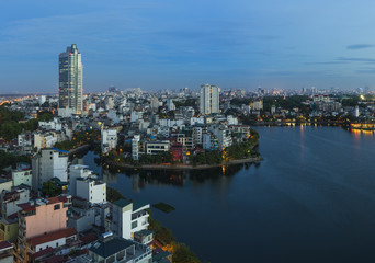 Hanoi skyline cityscape at twilight period. West Lake aerial view