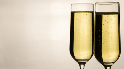 two glasses of sparkling white wine