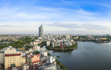 Fototapeta premium Hanoi skyline cityscape at sunset period. West Lake aerial view
