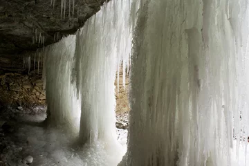 Deurstickers Frozen waterfall © alyssamaephoto