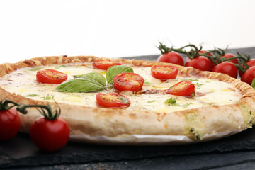 Hot true PEPPERONI ITALIAN PIZZA with salami and cheese. TOP VIEW Tasty traditional pepperoni pizza on board on wooden table with decoration
