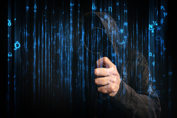 Computer hacker with hoodie in cyberspace surrounded by matrix c