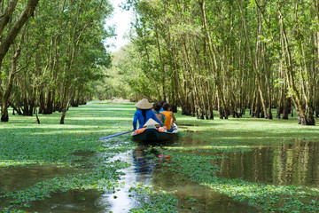 Tourism rowing boat in Mekong delta, Vietnam - obrazy, fototapety, plakaty