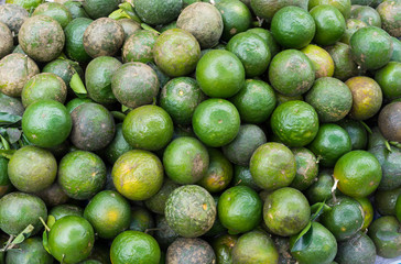 Lemon, tropical fruit displayed at Vinh Long fruit market, Mekong delta. The majority of Vietnam's fruits come from the many orchards of the Mekong Delta