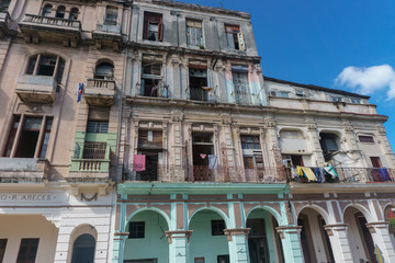 Fototapeta na wymiar La Havana, Cuba – December 25, 2016: old house outdoors with balcony