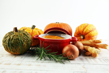 Pumpkin soup on a wooden table
