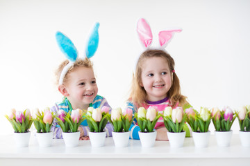 Kids with bunny ears on Easter egg hunt