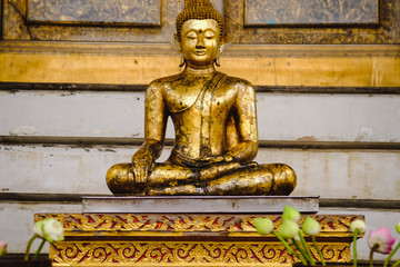 Public place Buddha statue with thai art architecture at Wat Suthat temple. This is a Buddhist temple in Bangkok .