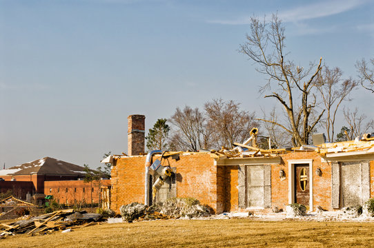 Aftermath of Tornado Damaged Houses and Property