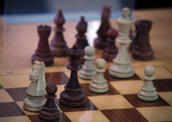 Chess on a wooden board