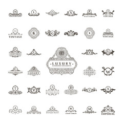 Luxury vintage logos set. Calligraphic emblems and elements