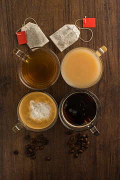 Cups with tea and coffee
