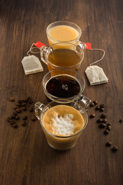 Cups with tea and coffee