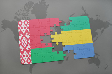 puzzle with the national flag of belarus and gabon on a world map