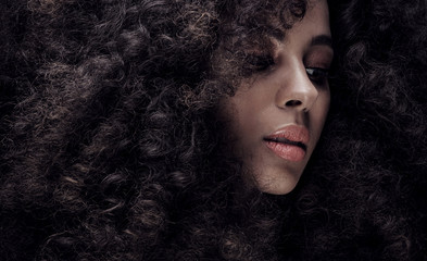 Beauty portrait of girl with afro. © neonshot
