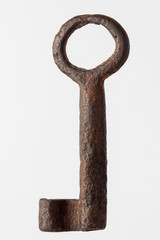 Antique rusty key isolated on white background