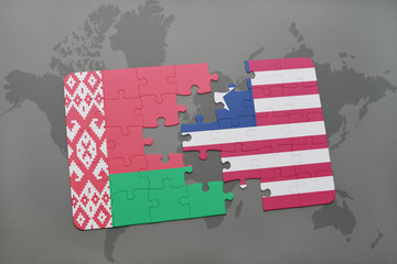puzzle with the national flag of belarus and liberia on a world map