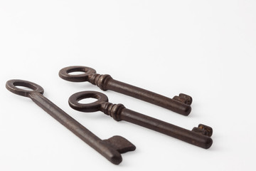 Antique rusty keys  isolated on white background