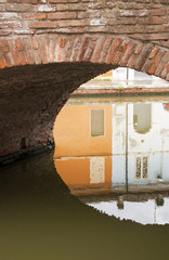  reflection in the canal in Comacchio