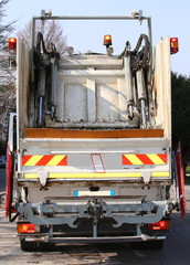 garbage trucks during the solid waste collection service in the