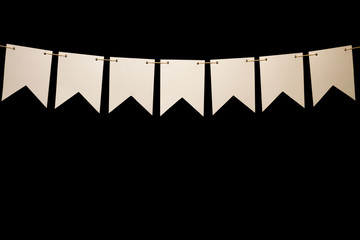 Bunting, seven white shapes on string for banner message
