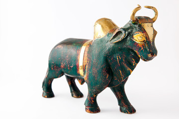 Fototapeta premium Wooden bull on white background