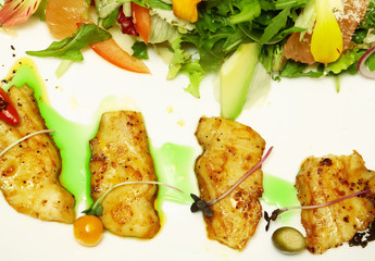 Fried fish and salad mix